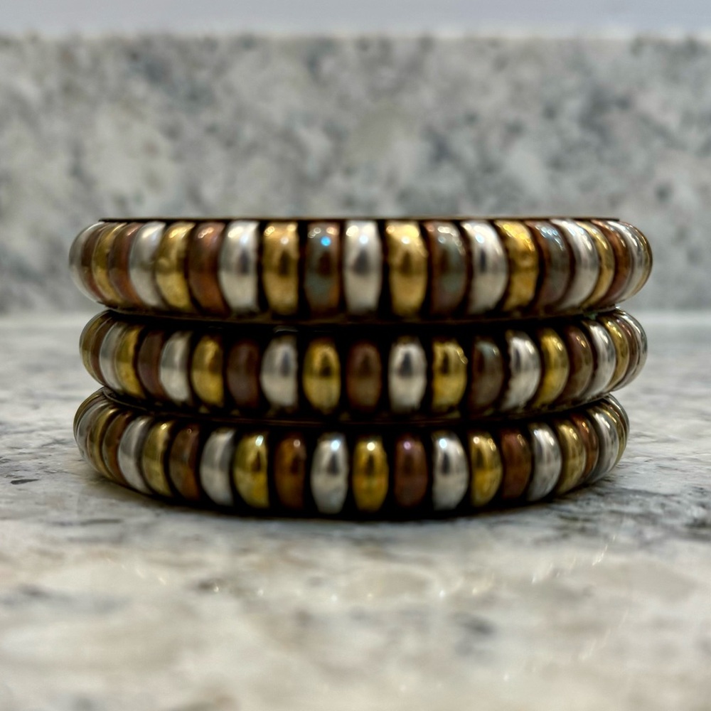 3 Bangles in Copper, Bronze, Silver. Slip over hand to wrist.